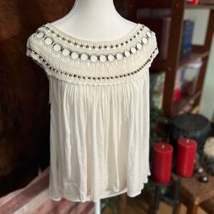 Cream Colored Heavy Beaded Free People Blouse size small flowy and soft fabric